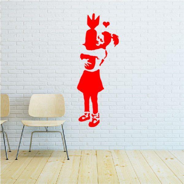 Girl with Bomb. Banksy's graffiti. Wall sticker. Red